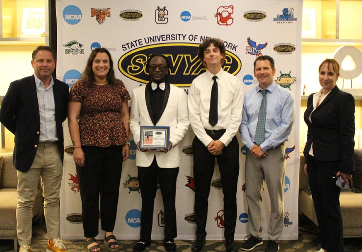 SUNYAC Award for Valor (l-r): Interim Co-Athletic Directors P.J. Gondek and Angela Pucciarelli Rice, Winn, Assistant Track and Field Coach Nick Abdo, Head Track and Field Coach Tom Wilson, and Vice President for Student Affairs Tracy Stenger