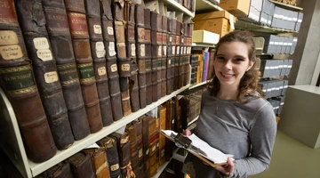 Fredonia student in the archives, history major, history program, history degree