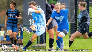 four soccer players in action