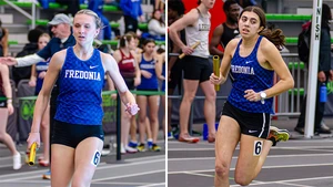 Emma Gassman and Siera Shenoy running in a relay