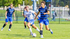 men playing soccer