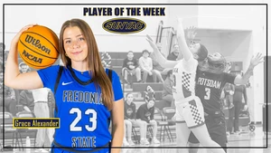 Grace Alexander holding a basketball