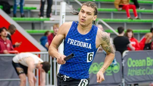 Cam Sample running on the track in a relay