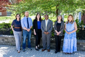 President Stephen H. Kolison Jr. (center) with SUNY Chancellor’s Award for Excellence recipients (from left): Erin Mroczka (Professional Service), Jason K. Bussman (Adjunct Teaching), Christina Hilburger (Librarianship), Dr. Reneta Barneva (Faculty Service) and Rhonda Gominiak (Classified Service).