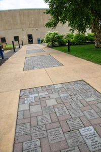 inscribed bricks on a walkway 