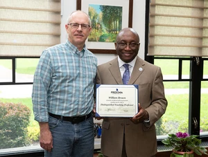 SUNY Distinguished Teaching Professor William Brown (left) with President Stephen H. Kolison Jr. 