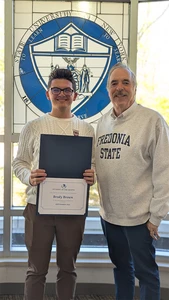 Brody Brown, with Daniel Cherry, front-of-house manager at Michael C. Rockefeller Arts Center, who nominated him for the Residence Life award.