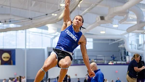 Cam Sample in action in the long jump