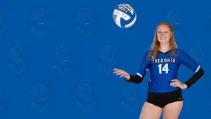 Christie Ackendorf throwing volleyball