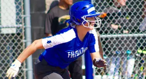 Eva FitzSimmons playing softball