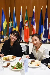 students at international dinner