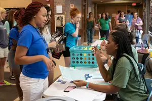student checking into residence hall