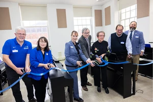 Emeritus Professor Phyllis East (third from right) and Yamaha representative Dom Cicchetti (second from right) join the Piano Lab ribbon-cutting ceremony with (from left) Operations Manager Marc Levy, Assistant Professor Jiyong Kim Mai, Vice President for Student Affairs Tracy Stenger, SUNY Distinguished Professor James Davis and Fredonia College Foundation Major Gifts Officer Tim Smeal.