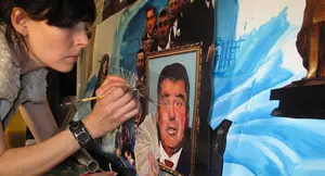 Martha Colburn works on her piece Dolls vs. Dictators.