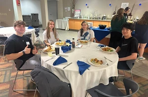 students enjoying the dinner 
