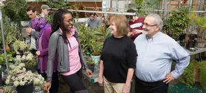 Joseph and Jane (Schuster) Falcone, '74, in the Science Center greenhouse that bears their name.
