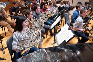 members of the wind ensemble performing