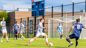 soccer players in action on the field