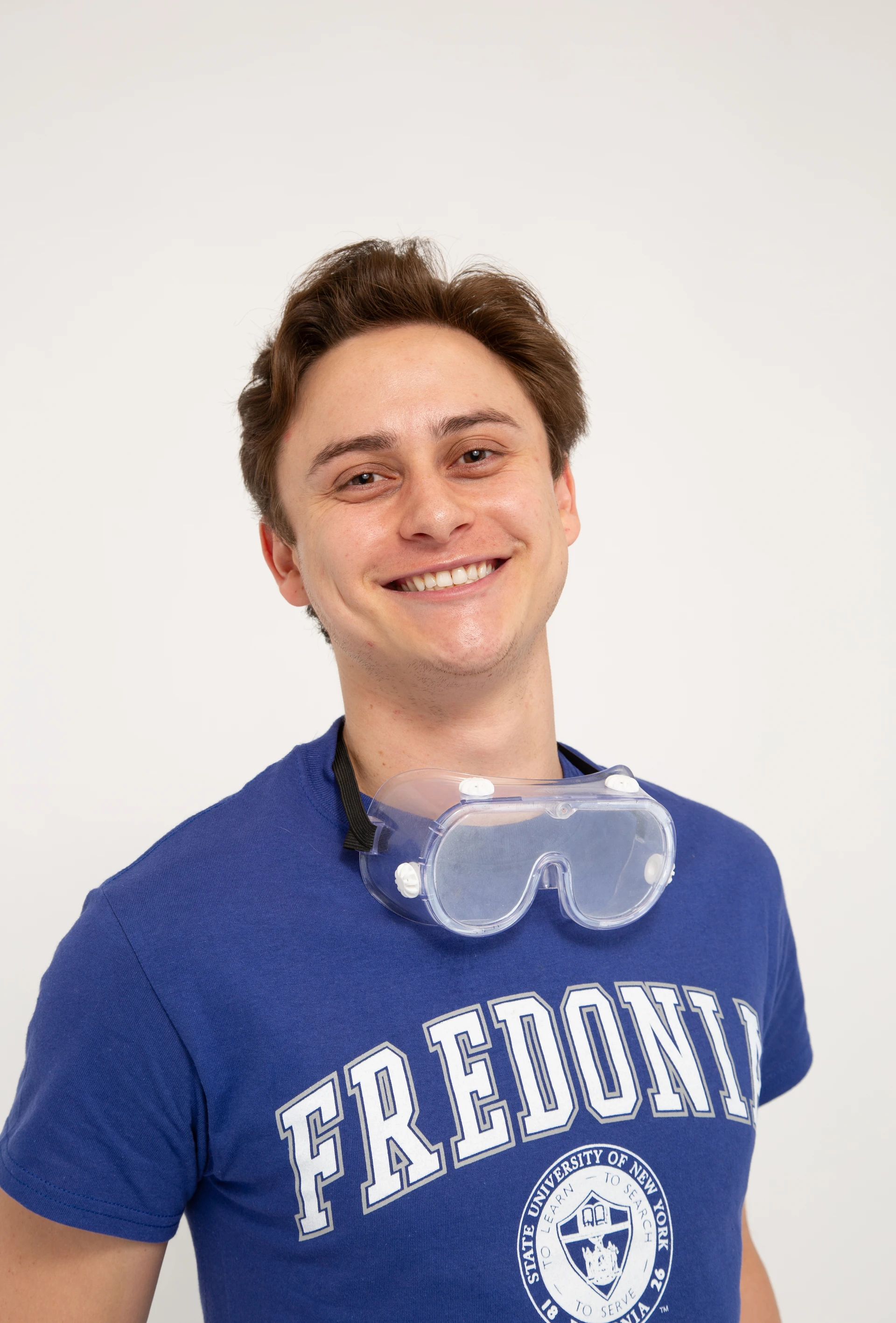 Fredonia student Hunter Burczyk smiling wearing goggles