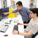 Fredonia students like the young man in the computer lab, enjoy a 12:1 student to faculty ratio