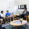 Chancellor King talking with current students
