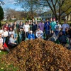 students in a group with rakes