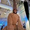 Gabriel Croom in giraffe costume in "The Lion King"