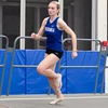 Emma Gassman running on the track