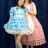 two female cast members in costume
