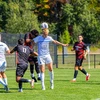 soccer players in action on the field
