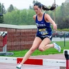 female athlete running the steeplechase