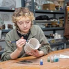 student working in the ceramics studio