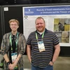 Jasper Bateman and Associate Professor Tom Hegna in front of their poster presented at the conference.