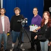 Nicholas Smith (second from right), with his student crew (from left) Anthony Derby, Conor Clary and Samantha Zotara in the McEwen Hall film studio.