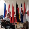 international student playing the guitar