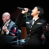 Kristine Hsia singing with band