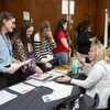 Amy Piper, a SUNY Fredonia alumnus and principal of Wheelock Early Childhood  Center, discusses opportunities in the Fredonia Central School District with Macy Short, Holly Rohrbach and Alissa Dixon.