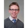Dr. Justin Conroy head shot
