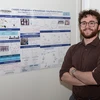 Sawyer Oppenneer, with his award-winning research poster.