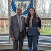 Melanie Tunstall, with her Student of the Month certificate, and Dr. Moj Seyedian.