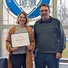 Alyssa LeGrette, holding her Student of the Month certificate, with Mark Mackey, of ITS.