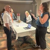 Social Work student describes her project to Dean Andy Karafa