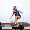athlete running the steeplechase