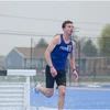 SUNY Fredonia athlete running the steeplechase