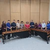 students standing in front of xylophones