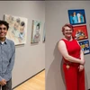 students standing next to their art work