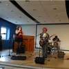 band playing on stage in the Williams Center