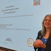 presenter Valerie Mackiewicz, M.S., AACC, CACP in front of screen
