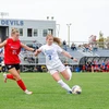 soccer players in action on the field