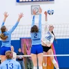 women playing volleyball by Travis Bernhard